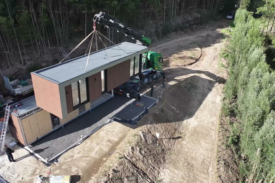 Module being set down on site by crane